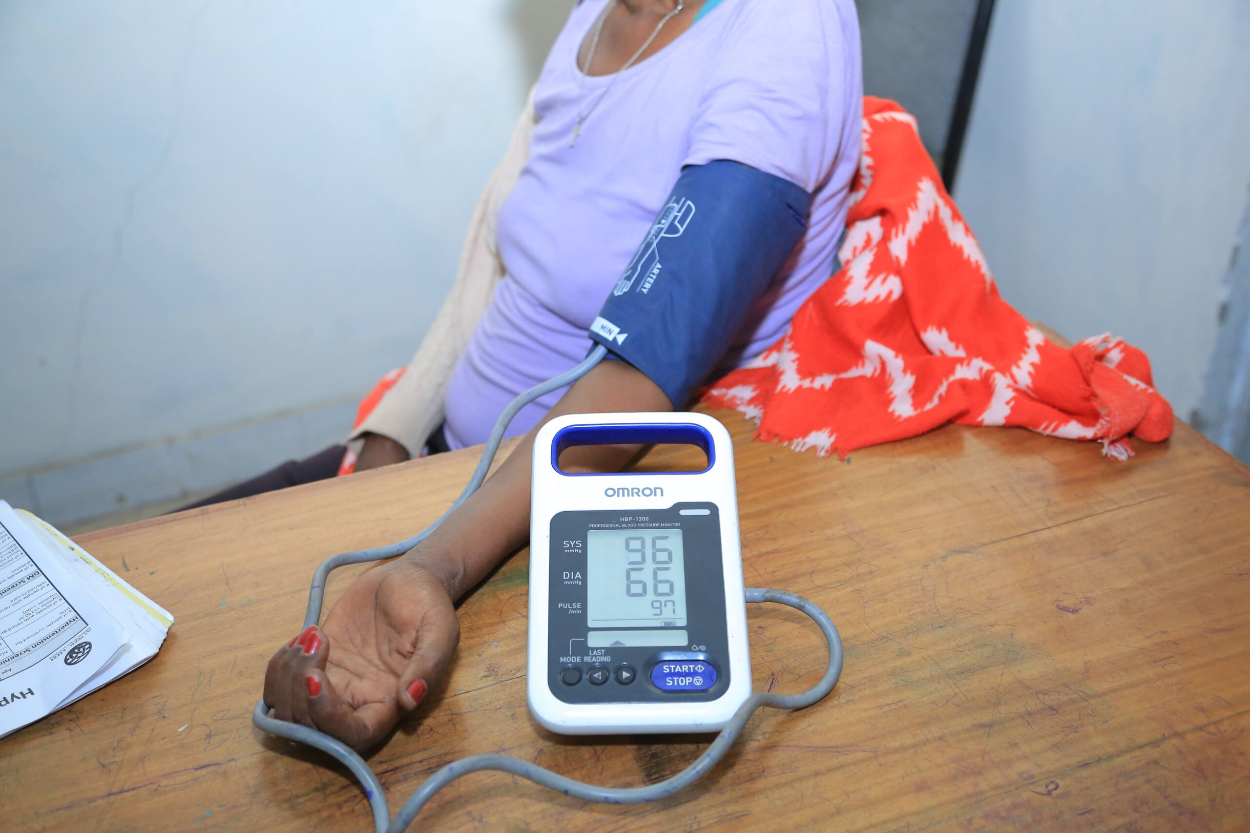 Patient gets blood pressure measured to check for hypertension. Managing hypertension can save lives