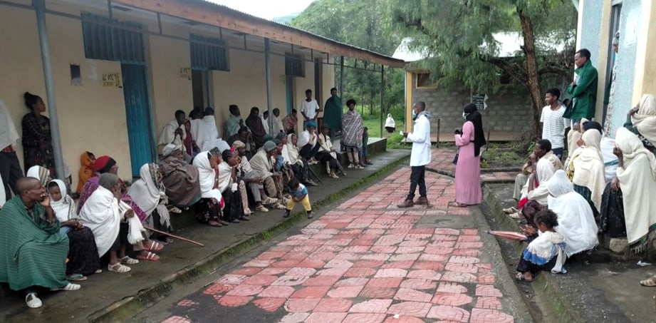 Distribution of Water, Sanitation, and Hygiene (WASH) supplies at a holy water pilgrimage site in Amhara, Ethiopia. Image credit: Hanna Mekonnen, Ethiopian Public Health Institute.