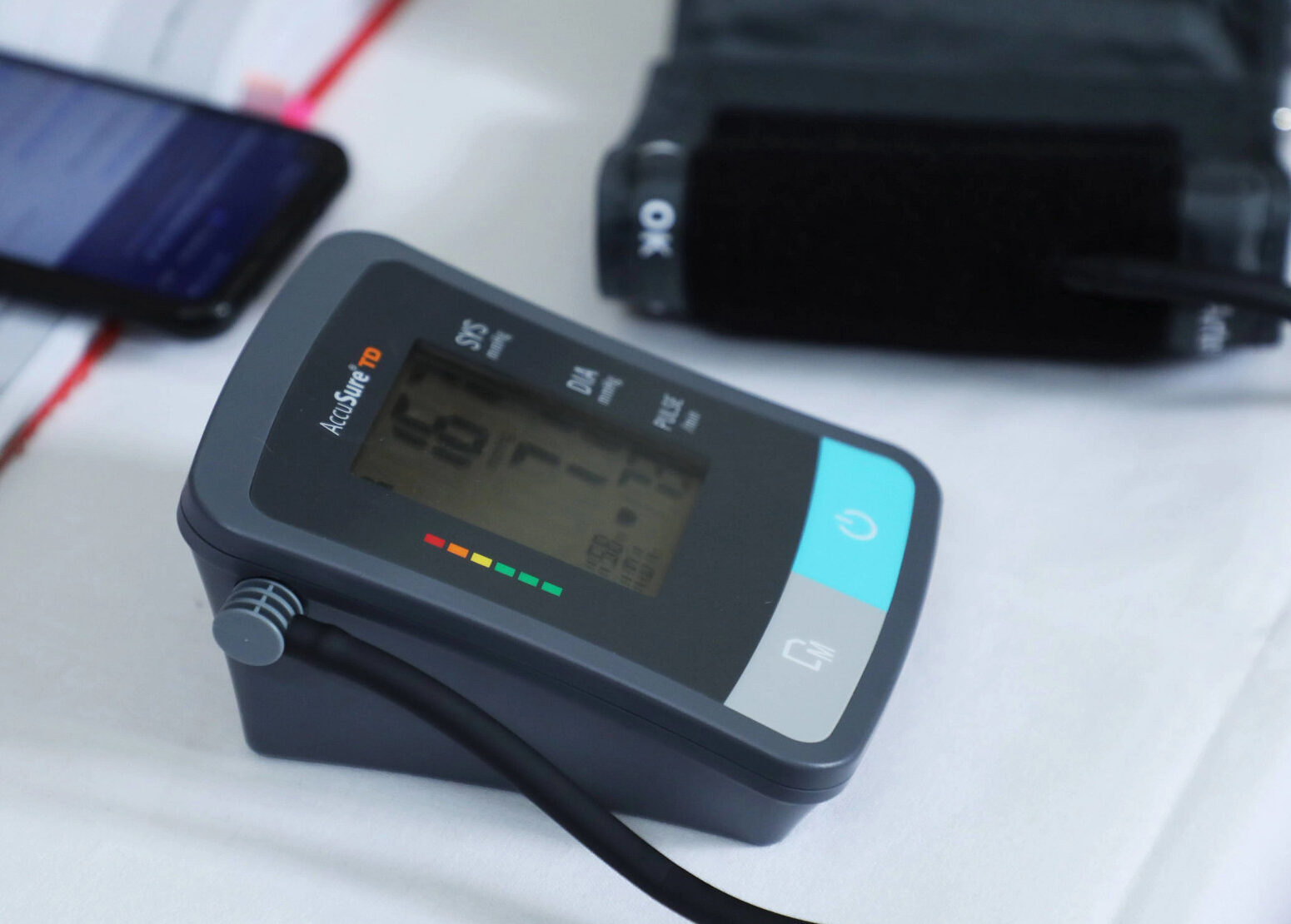 Digital blood pressure monitor on a table