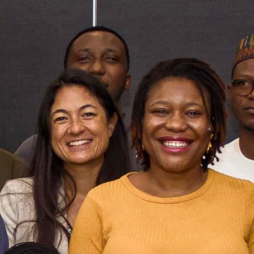 Three smiling staff members