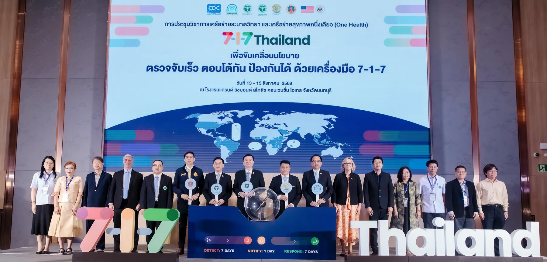 An African health care worker standing outside in a mask