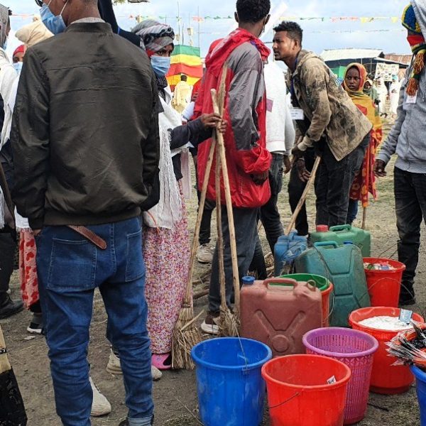 Distribution of Water, Sanitation, and Hygiene (WASH) supplies at a holy water pilgrimage site in Amhara, Ethiopia. Image credit: Hanna Mekonnen, Ethiopian Public Health Institute.