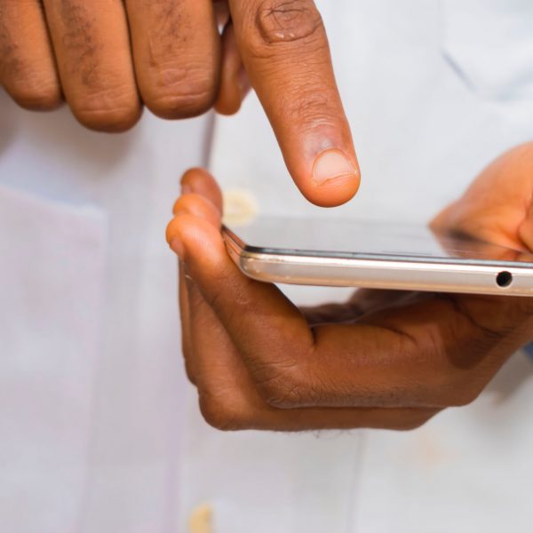 Health care worker using smartphone